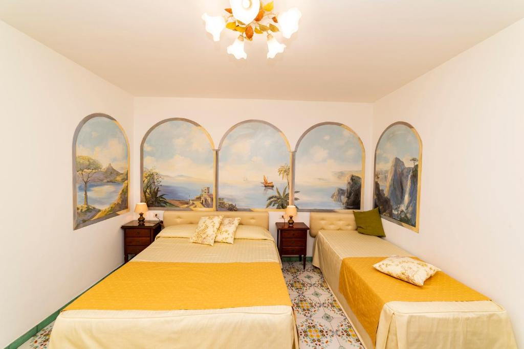 Postel nebo postele na pokoji v ubytování Casa Teresa