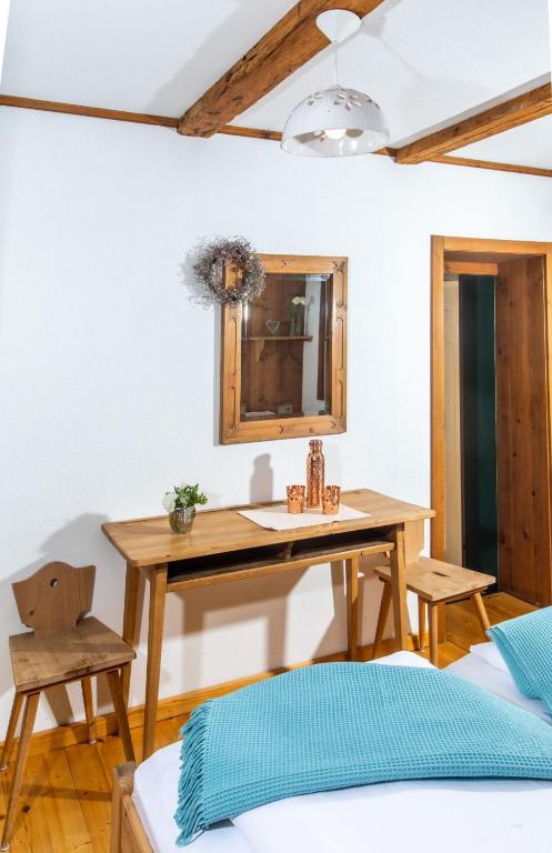 Postel nebo postele na pokoji v ubytování Bruggenwirt