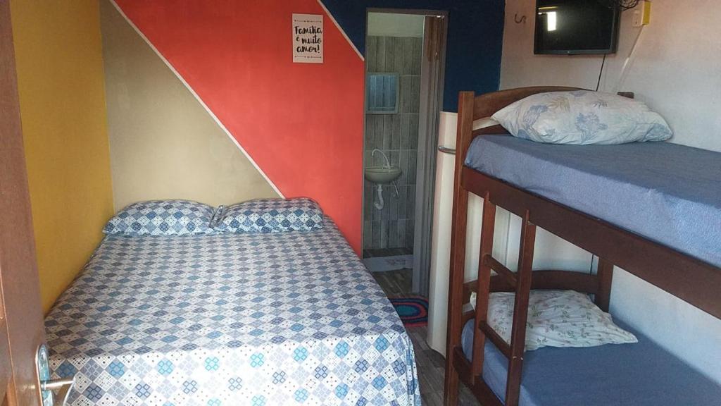 Postel nebo postele na pokoji v ubytování Pousada Aconchego