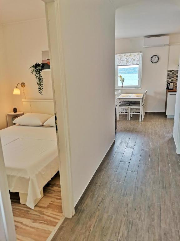 Posteľ alebo postele v izbe v ubytovaní Apartment Roman