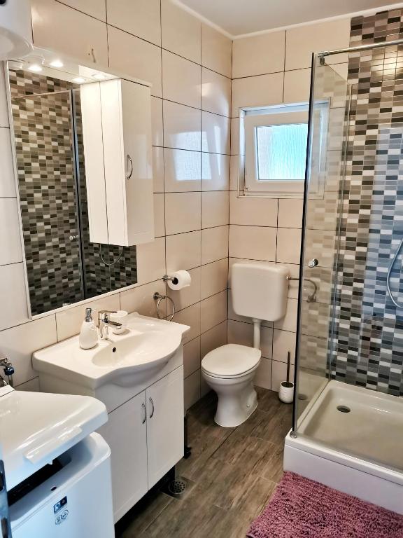 Kúpeľňa v ubytovaní Apartment Roman