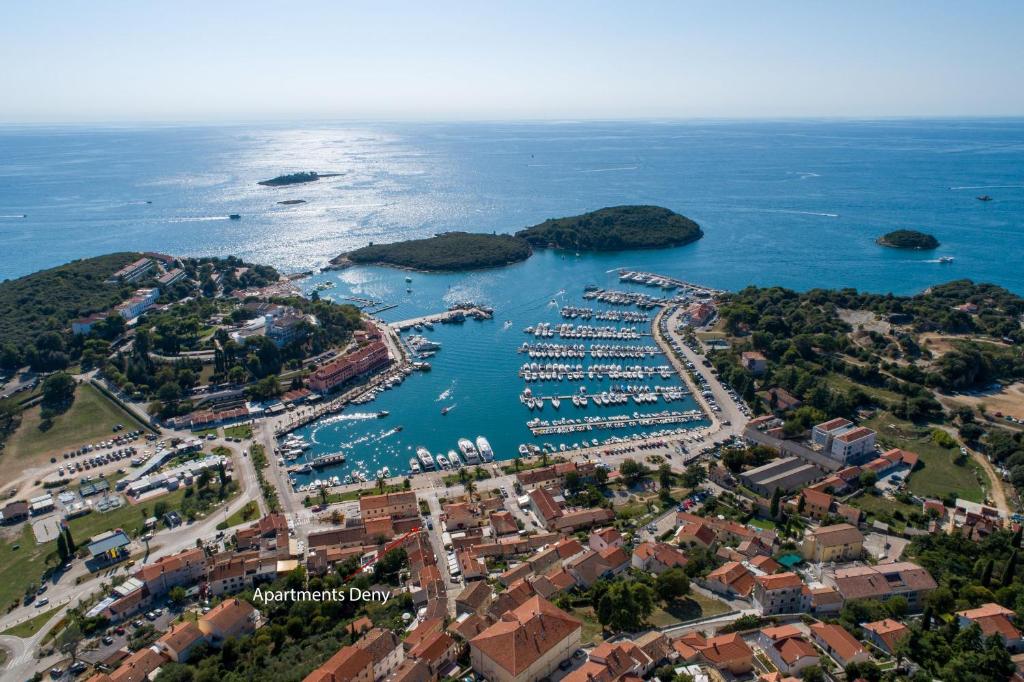 an aerial view of a harbor with boats in the water at Apartments Deny in Vrsar