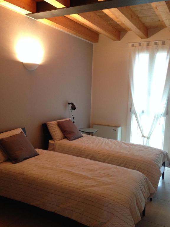 Postel nebo postele na pokoji v ubytování Casa di Giulia