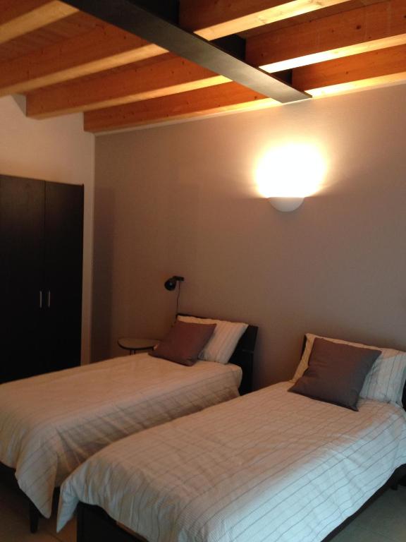 Postel nebo postele na pokoji v ubytování Casa di Giulia