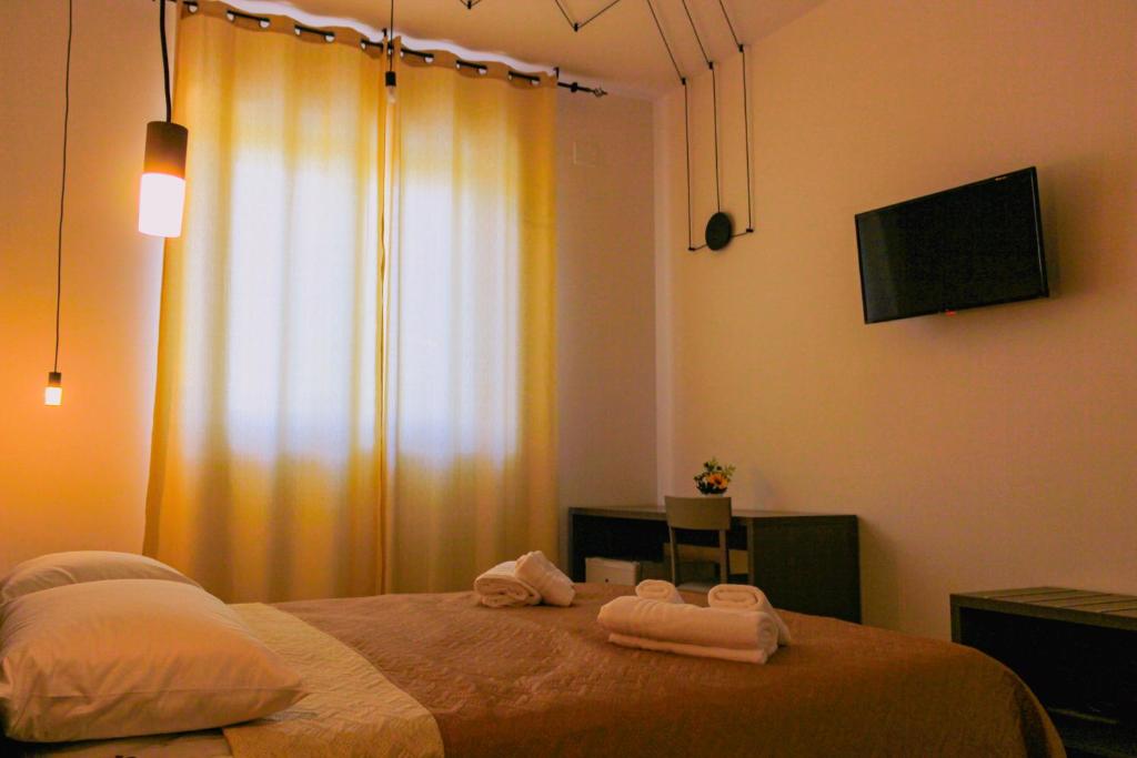 Postel nebo postele na pokoji v ubytování Armonia Galeta