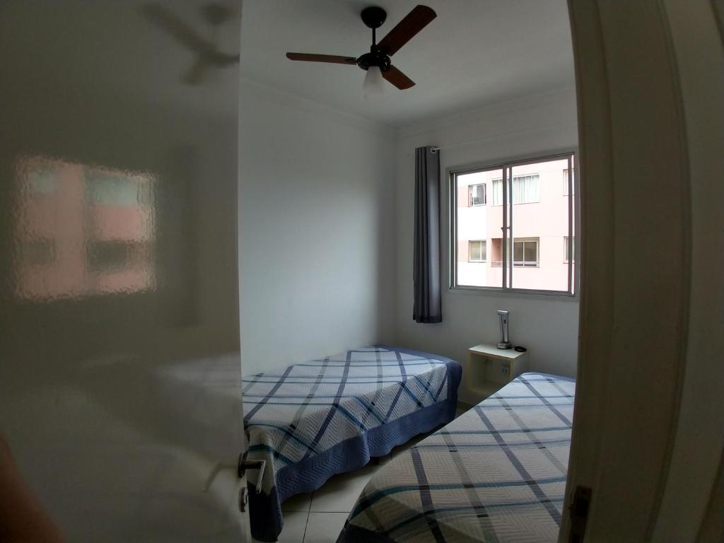  Apartamento Temporada/ 2 quartos / Confortável/ Itaparica/Vila Velha / ES spaçoso Wifi - Ar- Cozinha - Estacionamento