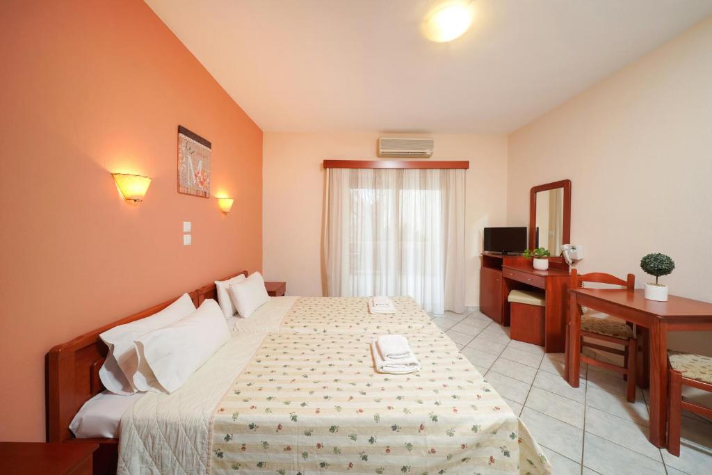 Postel nebo postele na pokoji v ubytování Hotel Makrina