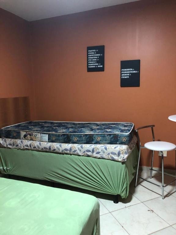 En eller flere senge i et værelse på Flat thermas place - caldas novas