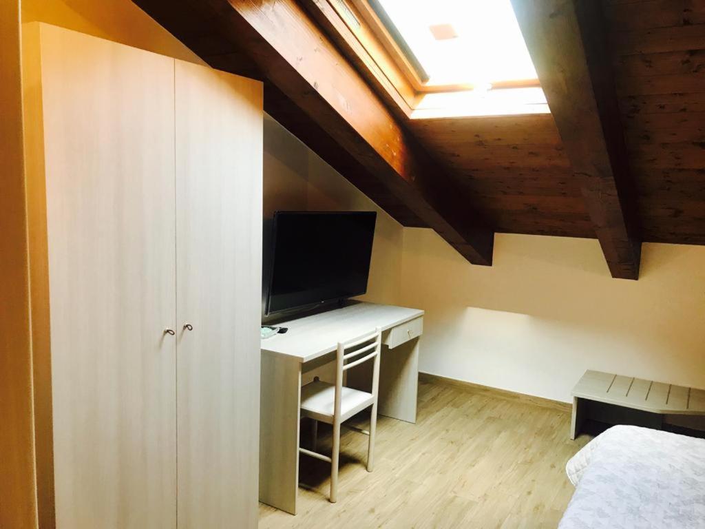 Una cama o camas en una habitación de B&B Lanziani