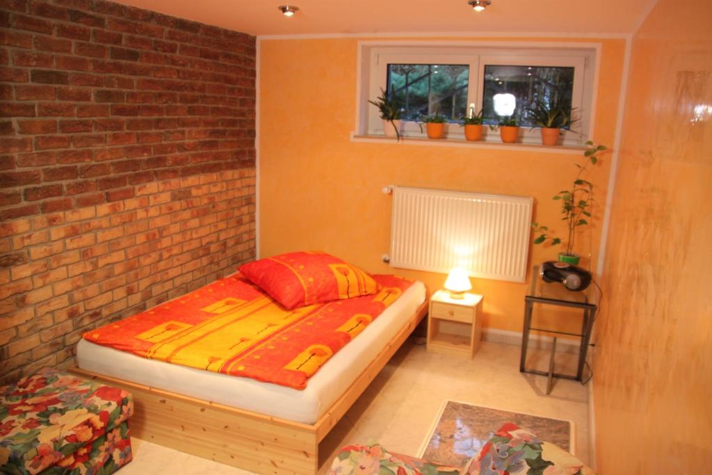 Postel nebo postele na pokoji v ubytování Ferienwohnung Friedrichshagen