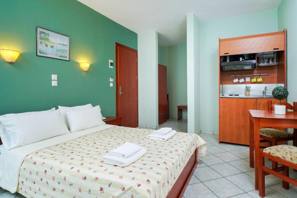 Postel nebo postele na pokoji v ubytování Hotel Makrina