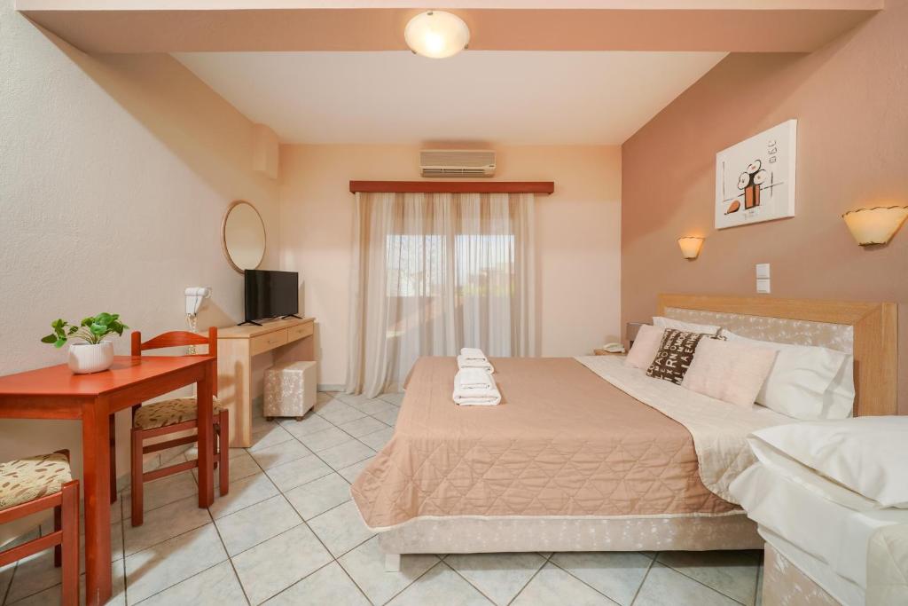 Postel nebo postele na pokoji v ubytování Hotel Makrina
