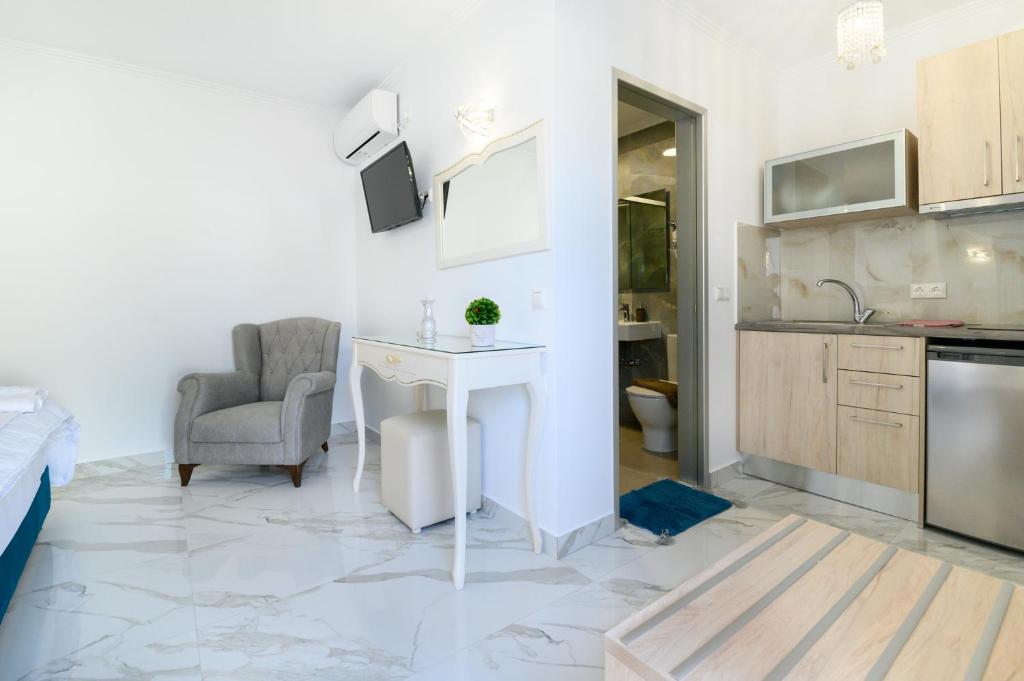 Kuchyň nebo kuchyňský kout v ubytování Sueño Suites