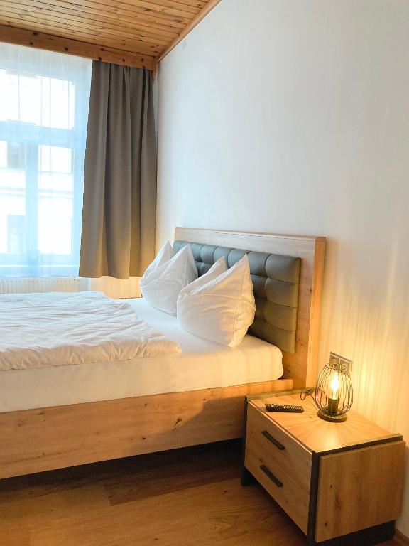 Posteľ alebo postele v izbe v ubytovaní APARTMENTS zum Wohlfühlen MARIAZELL
