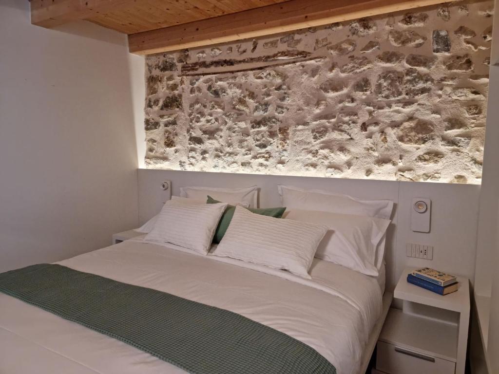 Postel nebo postele na pokoji v ubytování Elle Ecoholiday