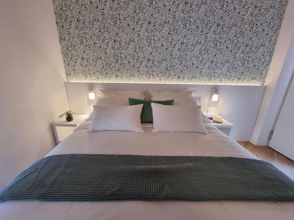 Postel nebo postele na pokoji v ubytování Elle Ecoholiday