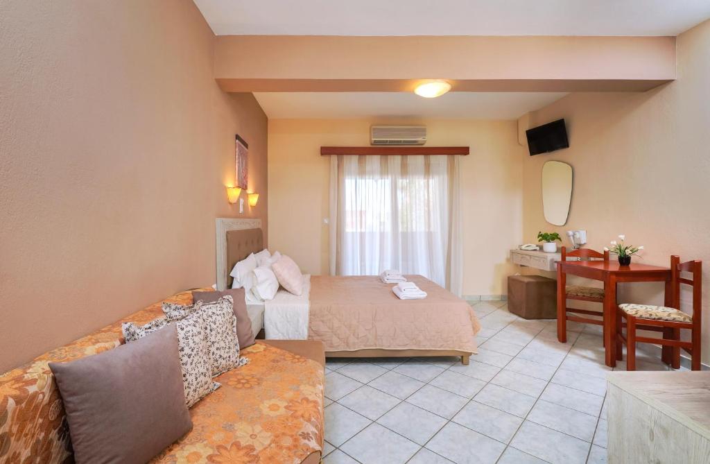 Postel nebo postele na pokoji v ubytování Hotel Makrina