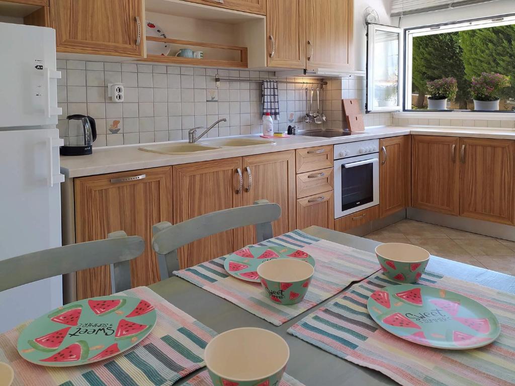 Kuchyň nebo kuchyňský kout v ubytování Seaside Villa Clio