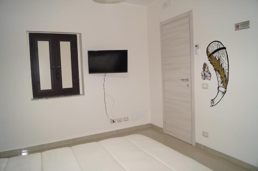 Telewizja i/lub zestaw kina domowego w obiekcie Briscola Home