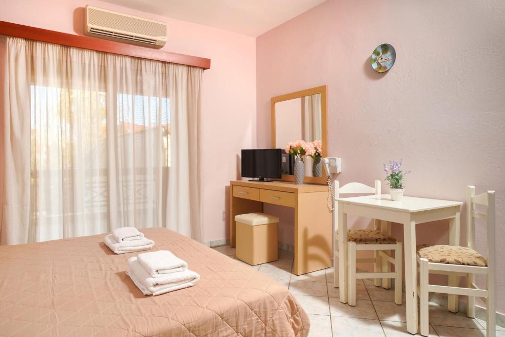 Postel nebo postele na pokoji v ubytování Hotel Makrina