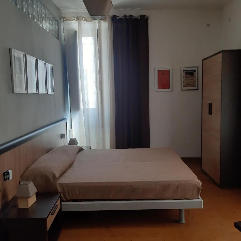 Postel nebo postele na pokoji v ubytování Casa Antioco B&B