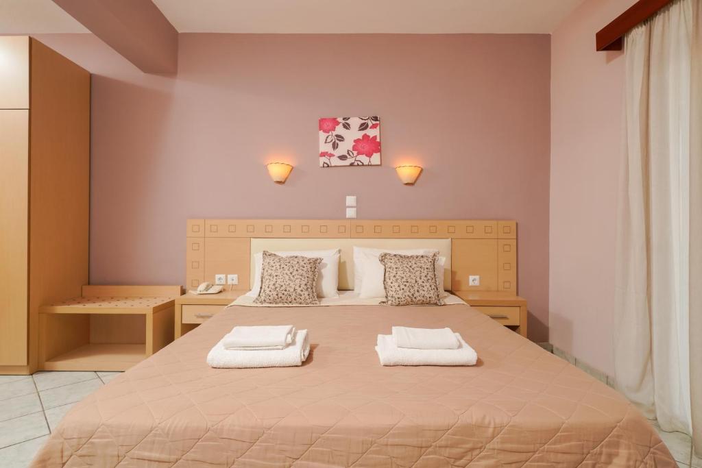 Postel nebo postele na pokoji v ubytování Hotel Makrina