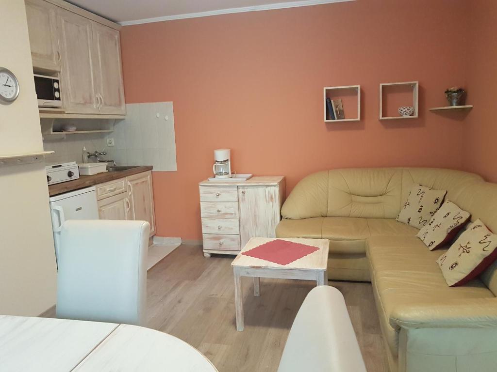 A kitchen or kitchenette at Marie Apartment MEGÚJULT - RENEWED