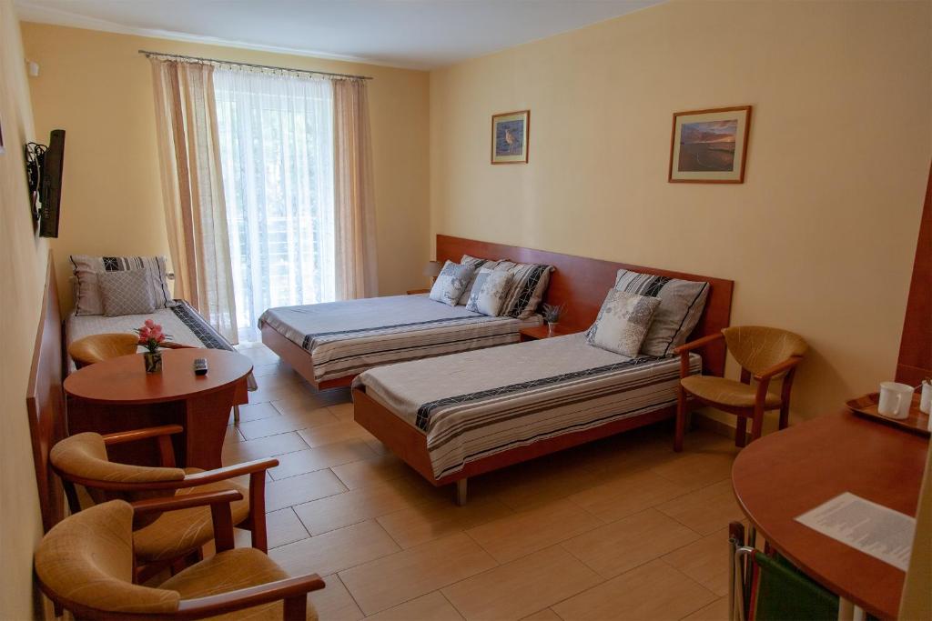 Holiday-Darłówko - Quadruple Room With Balcony