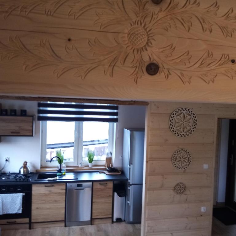 Kuchyňa alebo kuchynka v ubytovaní Domek u Andrzeja 2