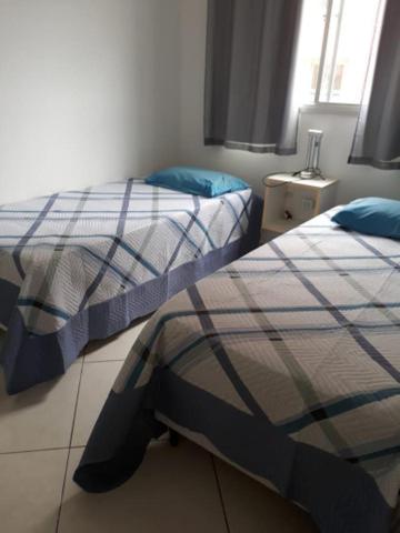  Apartamento Temporada/ 2 quartos / Confortável/ Itaparica/Vila Velha / ES spaçoso Wifi - Ar- Cozinha - Estacionamento