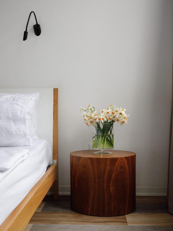 Postel nebo postele na pokoji v ubytování Mariinsky Boutique Hotel
