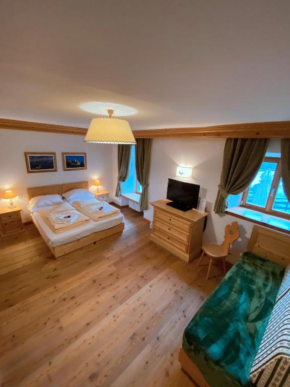 Postel nebo postele na pokoji v ubytování Rifugio Ospitale