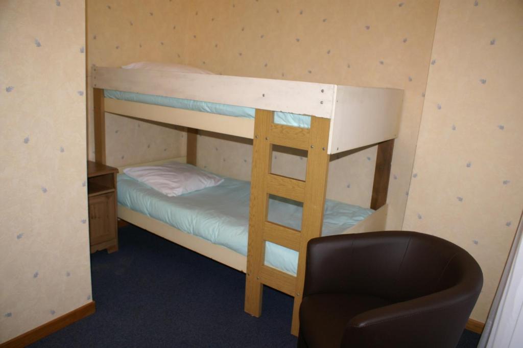 Postel nebo postele na pokoji v ubytování Hôtel Céleste
