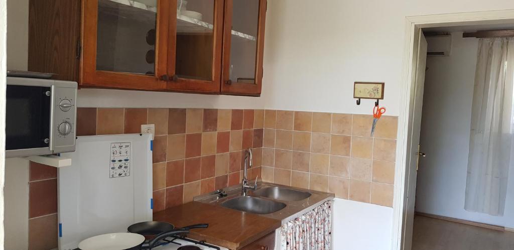 Kuchyňa alebo kuchynka v ubytovaní Apartment Srsen