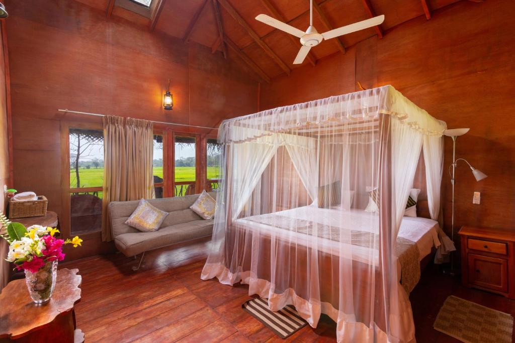 Postel nebo postele na pokoji v ubytování The Hideout Sigiriya
