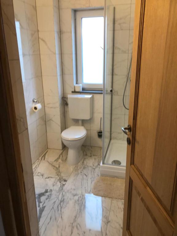 Koupelna v ubytování Pensiunea Giulia Home