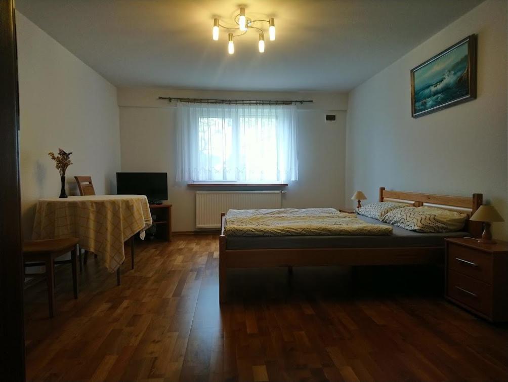 Posteľ alebo postele v izbe v ubytovaní Agroturystyka Pod Brzozami