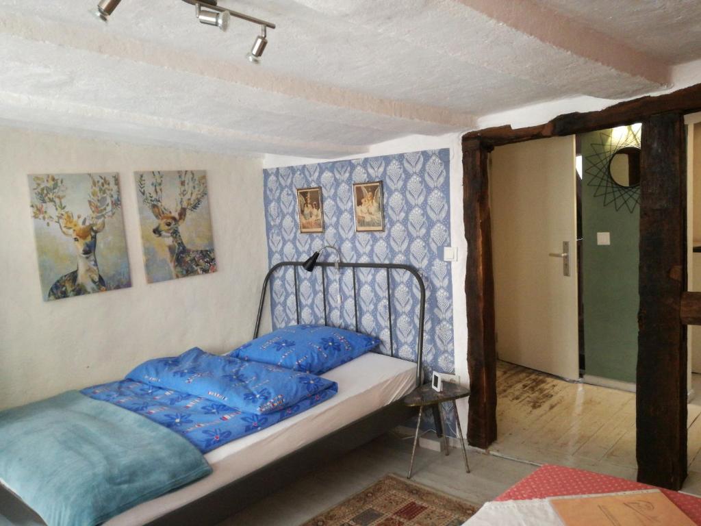 Postel nebo postele na pokoji v ubytování Haus Petersilie