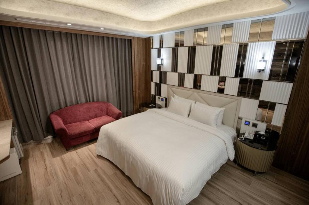 Postel nebo postele na pokoji v ubytování Point Motel