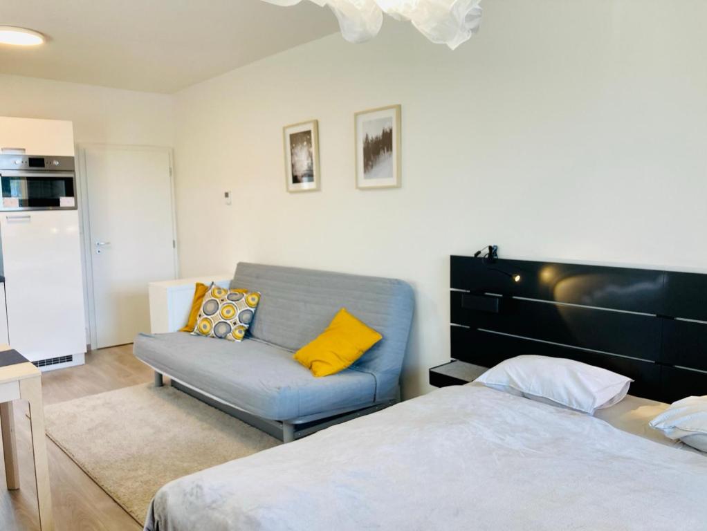 Postel nebo postele na pokoji v ubytování Apartmány 50