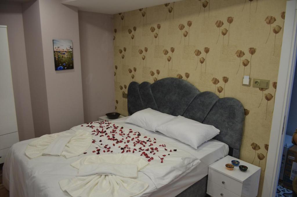 Postel nebo postele na pokoji v ubytování Rodion Hotel