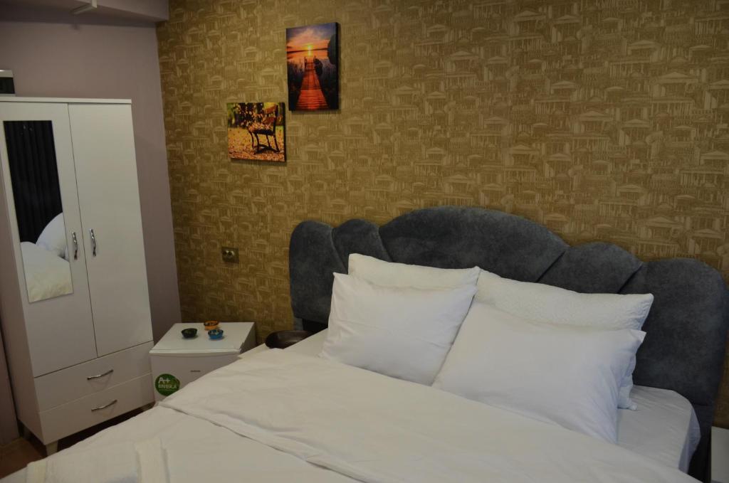 Postel nebo postele na pokoji v ubytování Rodion Hotel