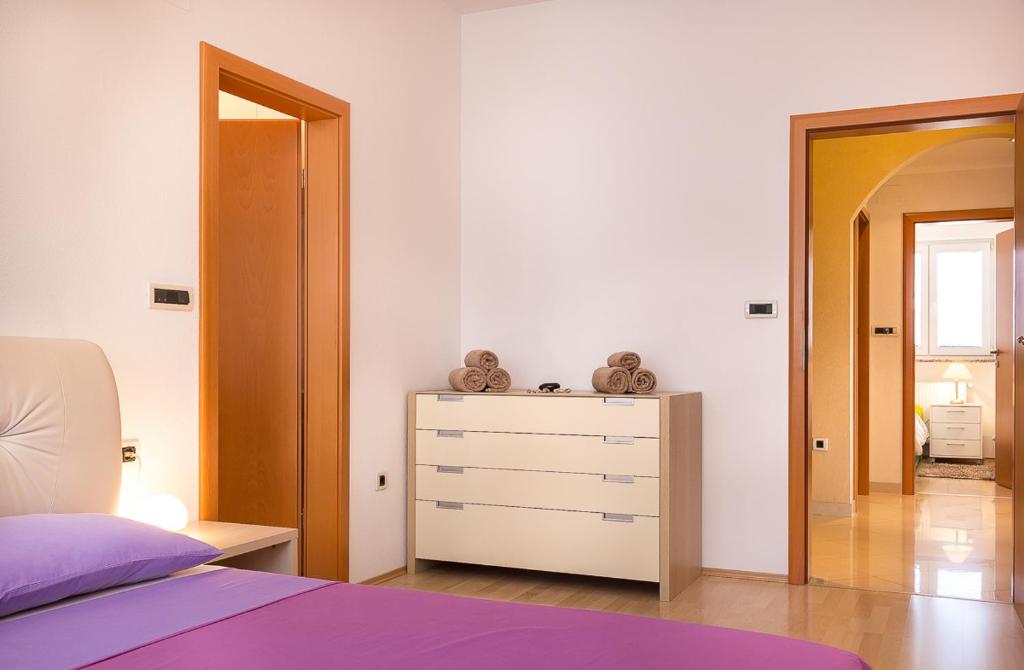 Postel nebo postele na pokoji v ubytování Apartment Igor 3 ****