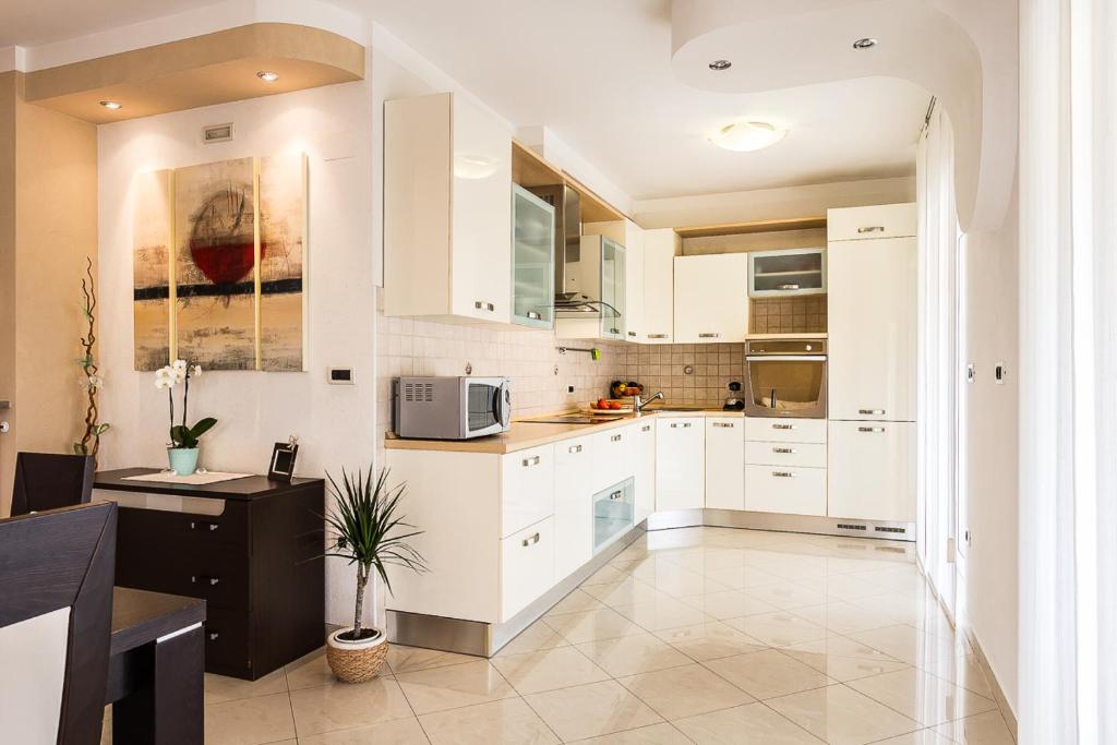 Kuchyň nebo kuchyňský kout v ubytování Apartment Igor 3 ****