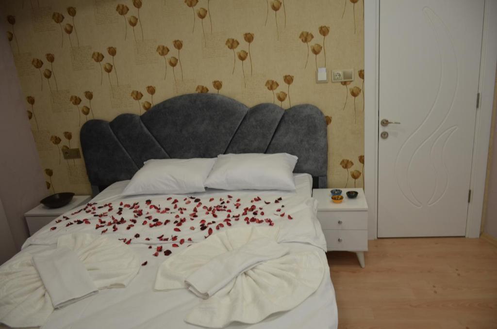 Postel nebo postele na pokoji v ubytování Rodion Hotel
