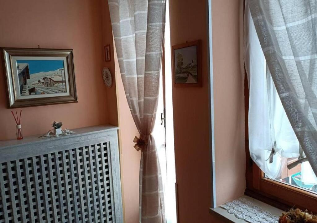 Łóżko lub łóżka w pokoju w obiekcie La Magnolia B&B