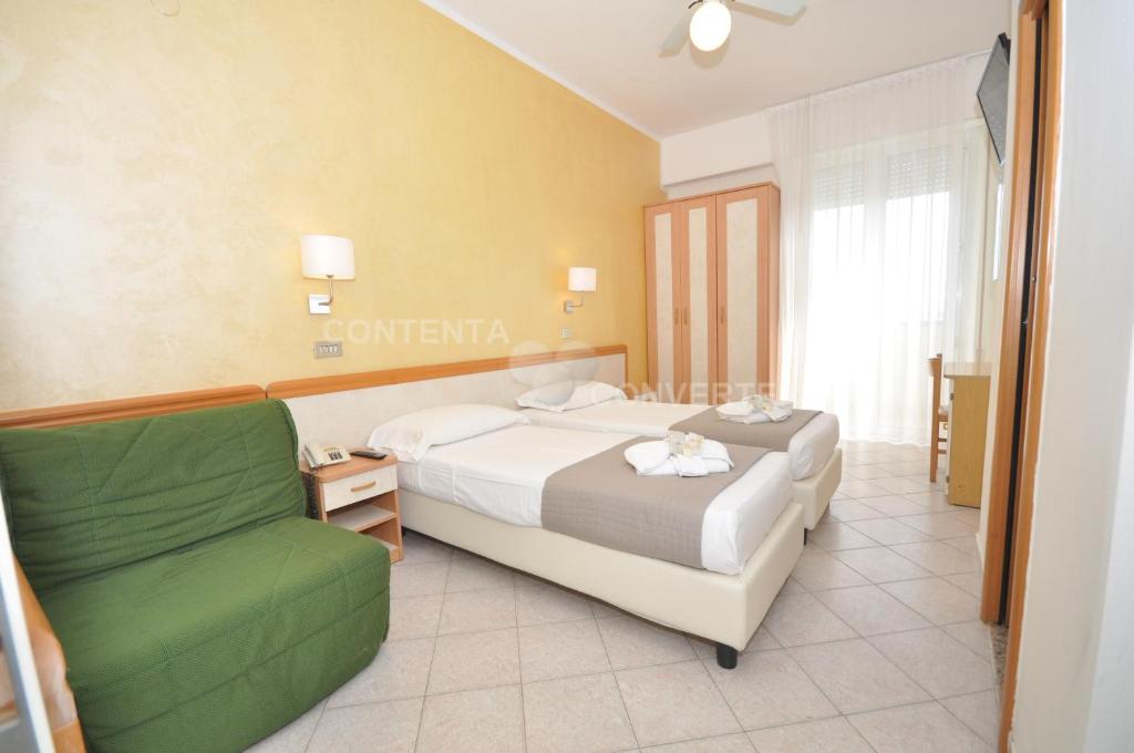 Postel nebo postele na pokoji v ubytování Hotel Adriatic&Beauty