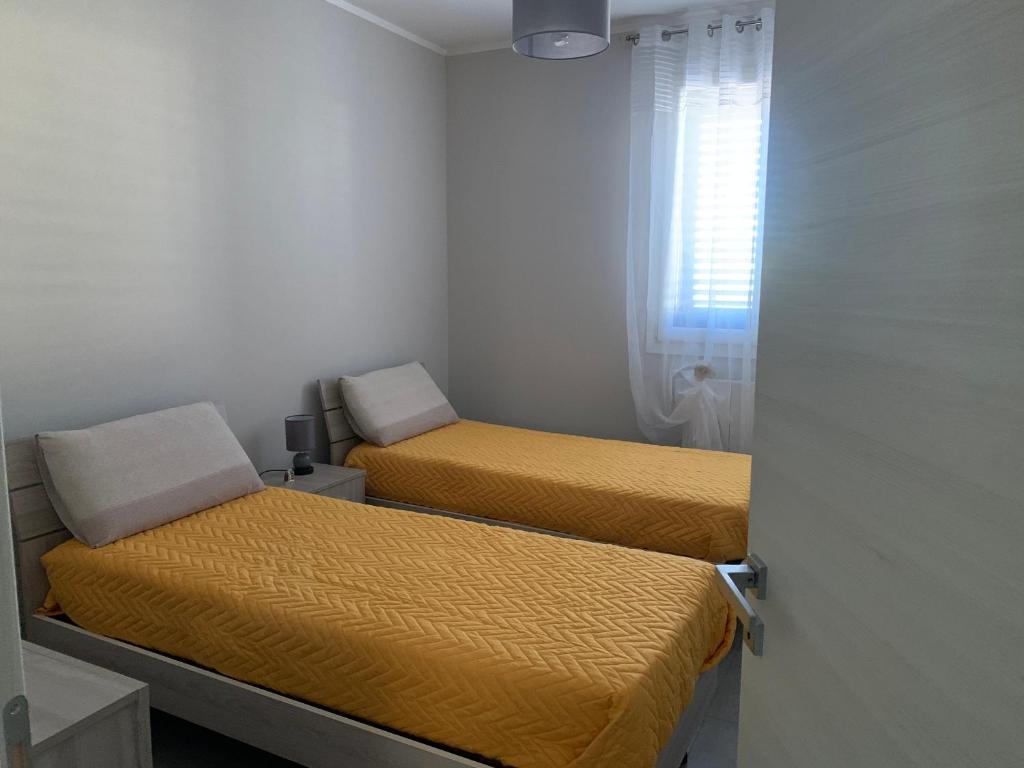 A bed or beds in a room at house231