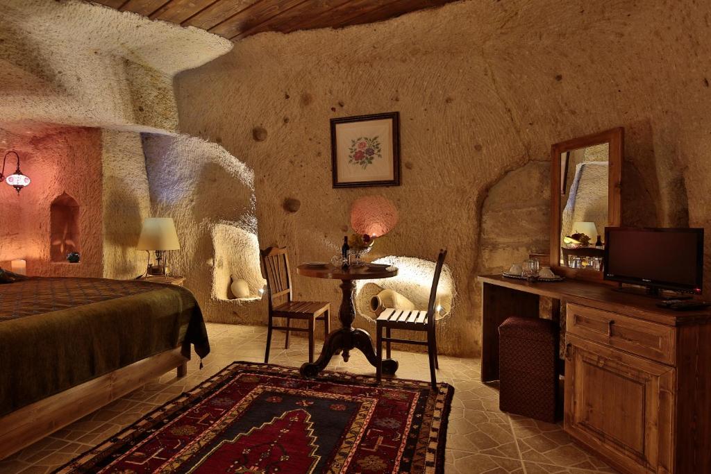 Postel nebo postele na pokoji v ubytování Turkish Cave House