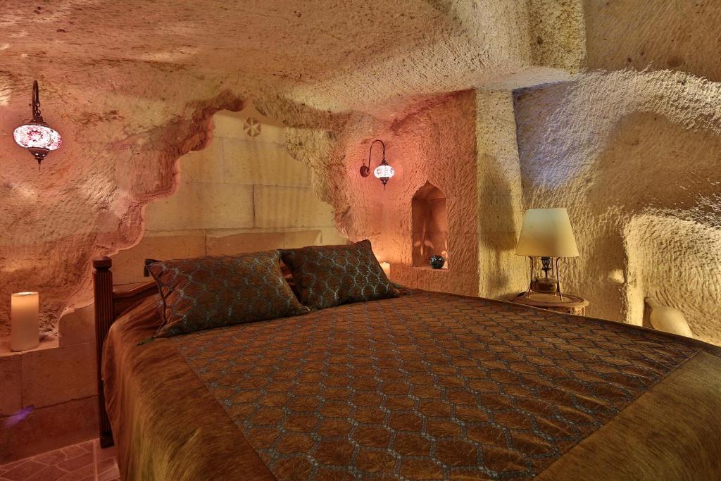 Postel nebo postele na pokoji v ubytování Turkish Cave House